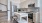 a kitchen with white cabinets