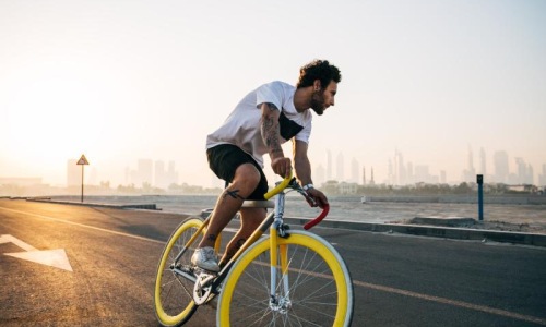 Find your perfect fit at Hamilton Crossing a man riding a bicycle on a road